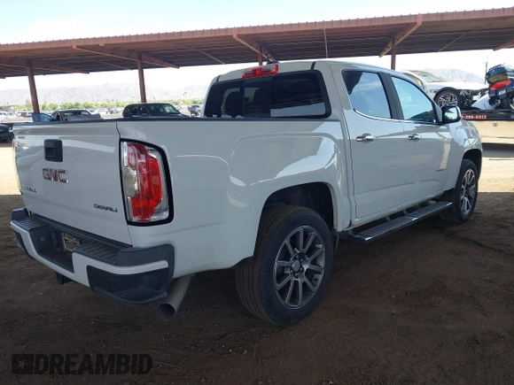 2018 GMC Canyon 4WD Denali z VIN 1GTP6EE11J1178961, wystawiony jako IAAI lot #42499884 z przebiegiem 71 309 mil mil oraz . Historia ofert i sprzedaży dostępna na DreamBid. Obrazek 4.