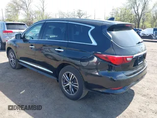 2018 Infiniti QX60 with VIN 5N1DL0MM4JC529193, listed as a IAAI auction lot 42091013 with 202,602 mi miles. Bid and sale history available at carsss.com. Image 3.