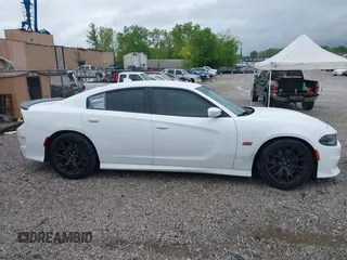 2019 Dodge Charger Scat Pack with VIN 2C3CDXGJ9KH691136, listed as a IAAI auction lot 42056137 with 78,814 mi miles and . Bid and sale history available at DreamBid. Image 13.