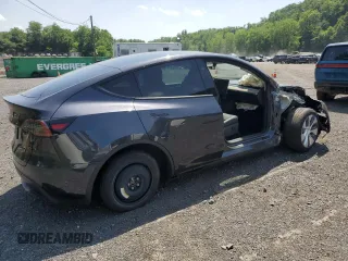2024 Tesla Model Y с VIN 7SAYGDED1RF092027, выставлен на аукционе Copart как лот 62330775 с пробегом 22 010 миль миль и Списание • Salvage title. История ставок и продаж доступна на DreamBid. Изображение 3.