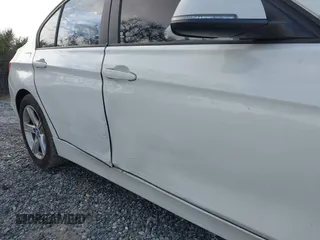 2014 BMW 3 Series 320i with VIN WBA3B1G59ENS78532, listed as a IAAI auction lot 41627172 with 133,049 mi miles. Bid and sale history available at carsss.com. Image 12.