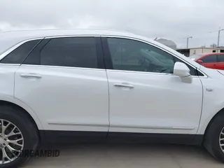 2017 Cadillac XT5 Luxury FWD z VIN 1GYKNBRS3HZ195197, wystawiony jako IAAI lot #42033419 z przebiegiem 76 709 mil mil oraz . Historia ofert i sprzedaży dostępna na DreamBid. Obrazek 13.