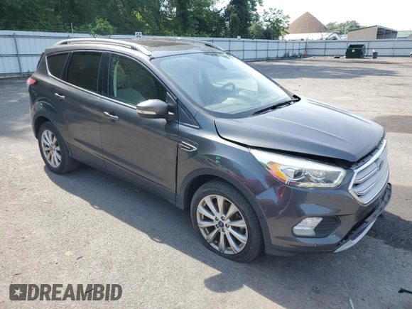 2018 Ford Escape Titanium with VIN 1FMCU9J91JUA47420, listed as a Copart auction lot 61846795 with 77,246 mi miles and Salvage title. Bid and sale history available at DreamBid. Image 4.