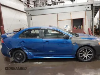 2009 Mitsubishi Lancer ES with VIN JA3AU26U29U036243, listed as a IAAI auction lot 41952044 with 181,650 mi miles. Bid and sale history available at carsss.com. Image 13.
