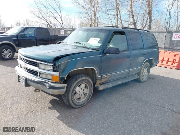 1995 Chevrolet Tahoe with VIN 1GNEK13K7SJ396709, listed as a IAAI auction lot 41776923 with 183,877 mi miles. Bid and sale history available at carsss.com. Image 2.