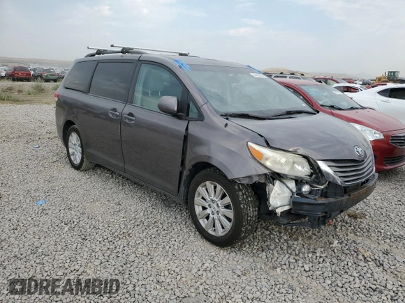 2012 Toyota Sienna XLE with VIN 5TDDK3DC7CS039221, listed as a Copart auction lot 64188804 with 180,811 mi miles and Salvage Title. Bid and sale history available at carsss.com. Image 4.