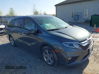 2018 Honda Odyssey EX-L z VIN 5FNRL6H75JB068929, wystawiony jako IAAI lot #41971228 z przebiegiem 102 043 mil mil oraz . Historia ofert i sprzedaży dostępna na DreamBid. Obrazek 1.