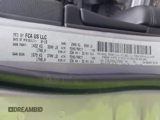 2018 Jeep Grand Cherokee Laredo E with VIN 1C4RJFAG4JC475993, listed as a IAAI auction lot 42295008 with 106,024 mi miles and . Bid and sale history available at DreamBid. Image 9.