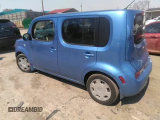 2013 Nissan Cube SL z VIN JN8AZ2KR3DT303672, wystawiony jako IAAI lot #41899753 z przebiegiem 117 840 mil mil oraz . Historia ofert i sprzedaży dostępna na DreamBid. Obrazek 3.