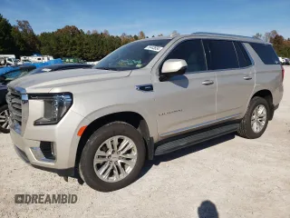 2021 GMC Yukon SLT with VIN 1GKS1BKDXMR435793, listed as a Copart auction lot 76443834 with 71,027 mi miles and Salvage Title. Bid and sale history available at carsss.com. Image 1.