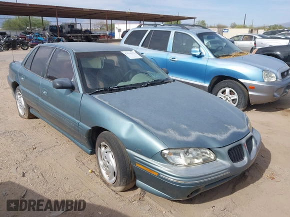 1996 Pontiac Grand Am SE with VIN 1G2NE52M8TC810732, listed as a IAAI auction lot 42338979 with 107,027 mi miles and . Bid and sale history available at DreamBid. Image 1.