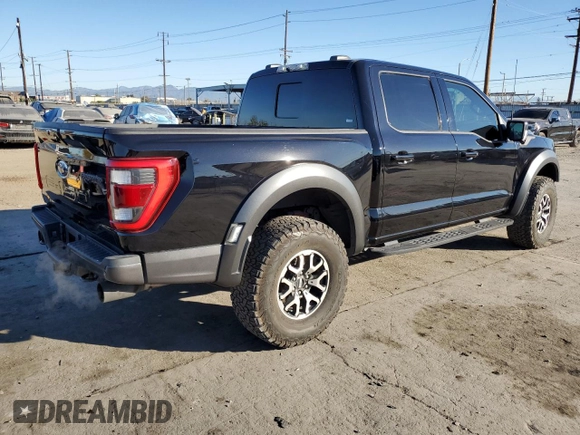 2021 Ford F-150 Raptor with VIN 1FTFW1RG3MFC62242, listed as a Copart auction lot 85596594 with 33,497 mi miles and Salvage Title. Bid and sale history available at carsss.com. Image 3.