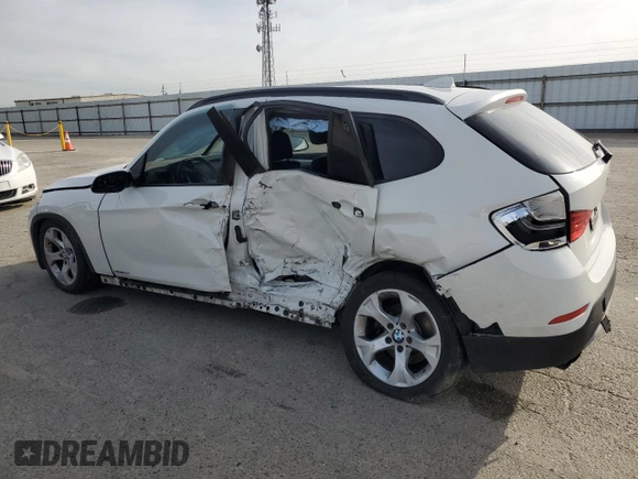 2015 BMW X1 sDrive28i with VIN WBAVM1C58FVZ93621, listed as a Copart auction lot 49897325 with 72,884 mi miles and Salvage Title. Bid and sale history available at carsss.com. Image 2.