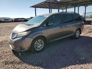 2012 Toyota Sienna XLE AAS with VIN 5TDYK3DC1CS261755, listed as a Copart auction lot 61042675 with 170,633 mi miles and Salvage title. Bid and sale history available at DreamBid. Image 1.