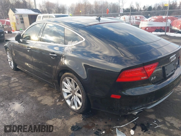 2013 Audi A7 Prestige with VIN WAU2GAFC1DN142732, listed as a IAAI auction lot 41396761 with 116,980 mi miles and . Bid and sale history available at DreamBid. Image 3.