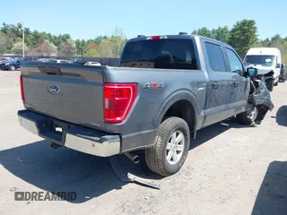 2022 Ford F-150 XL with VIN 1FTFW1E87NFB86556, listed as a IAAI auction lot 42157650 with 54,726 mi miles and . Bid and sale history available at DreamBid. Image 4.