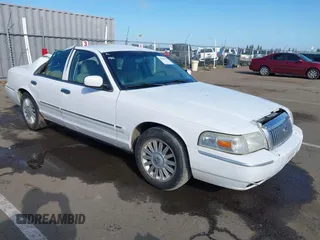 2008 Mercury Grand Marquis LS z VIN 2MEFM75V68X647087, wystawiony jako IAAI lot #41936416 z przebiegiem 263 636 mil mil oraz . Historia ofert i sprzedaży dostępna na DreamBid. Obrazek 1.
