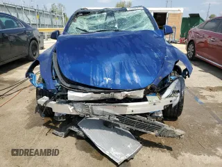 2022 Tesla Model Y Long Range z VIN 7SAYGDEE8NF447410, wystawiony jako Copart lot #54860765 z przebiegiem Nie podano mil oraz Szkody całkowita. Historia ofert i sprzedaży dostępna na DreamBid. Obrazek 5.