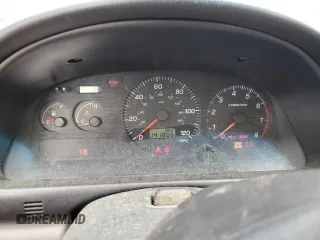 1999 Subaru Impreza L with VIN JF1GF4351XH815210, listed as a Copart auction lot 71250504 with 141,806 mi miles and Salvage title. Bid and sale history available at DreamBid. Image 9.