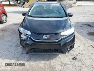 2015 Honda Fit EX-L z VIN 3HGGK5H8XFM700714, wystawiony jako Copart lot #79183164 z przebiegiem 40 648 mil mil oraz Nie do naprawy. Historia ofert i sprzedaży dostępna na DreamBid. Obrazek 5.
