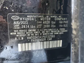 2023 Genesis G70 2.0T with VIN KMTG34TA1PU132593, listed as a Copart auction lot 49231195 with 36,246 mi miles and Salvage Title. Bid and sale history available at carsss.com. Image 12.