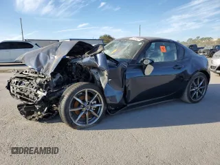 2021 Mazda MX-5 Miata Grand Touring z VIN JM1NDAM71M0451645, wystawiony jako Copart lot #72791514 z przebiegiem Nie podano mil oraz Szkoda całkowita • Salvage title. Historia ofert i sprzedaży dostępna na DreamBid. Obrazek 1.