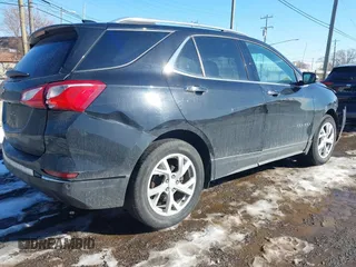 2018 Chevrolet Equinox Premier with VIN 2GNAXMEV3J6308064, listed as a IAAI auction lot 41652617 with 86,043 mi miles. Bid and sale history available at carsss.com. Image 4.