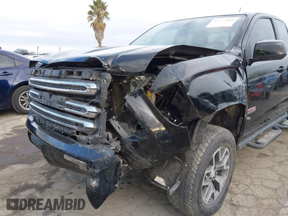 2016 GMC Canyon 4WD SLE with VIN 1GTH6CE33G1107926, listed as a IAAI auction lot 41777818 with 42,450 mi miles. Bid and sale history available at carsss.com. Image 6.
