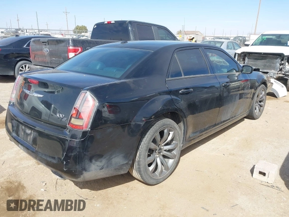 2014 Chrysler 300 with VIN 2C3CCABG7EH221929, listed as a IAAI auction lot 41700351 with 129,632 mi miles. Bid and sale history available at carsss.com. Image 4.