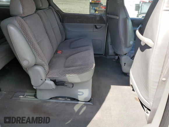 2000 Chrysler Voyager SE z VIN 1C4GJ44G9YB764195, wystawiony jako Copart lot #55095555 z przebiegiem 263 886 mil mil oraz Szkoda całkowita • Salvage title. Historia ofert i sprzedaży dostępna na DreamBid. Obrazek 11.