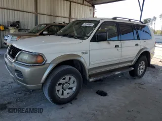 2003 Mitsubishi Montero z VIN JA4LS31R43J014899, wystawiony jako Copart lot #75130884 z przebiegiem 123 190 mil mil oraz Nie do naprawy • Non repairable. Historia ofert i sprzedaży dostępna na DreamBid. Obrazek 1.