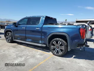 2022 GMC Sierra 1500 Denali with VIN 3GTU9FEDXNG213711, listed as a Copart auction lot 64112245 with 63,476 mi miles and Salvage title. Bid and sale history available at DreamBid. Image 2.