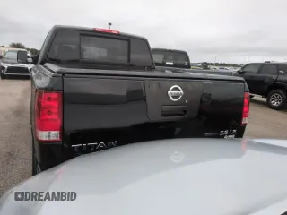 2010 Nissan Titan LE with VIN 1N6BA0EC8AN318538, listed as a Copart auction lot 74122194 with Not Provided miles and Salvage Title. Bid and sale history available at carsss.com. Image 6.