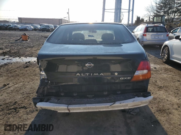 1999 Nissan Altima XE with VIN 1N4DL01D6XC134729, listed as a Copart auction lot 87204104 with 54,155 mi miles and Salvage Title. Bid and sale history available at carsss.com. Image 6.