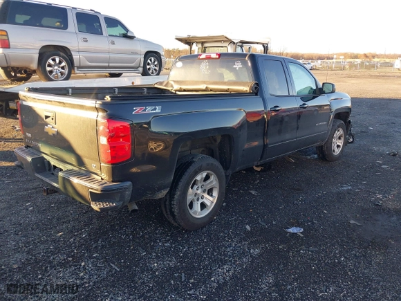 2017 Chevrolet Silverado 1500 LT with VIN 1GCVKREC8HZ331875, listed as a IAAI auction lot 40960777 with 147,157 mi miles. Bid and sale history available at carsss.com. Image 4.