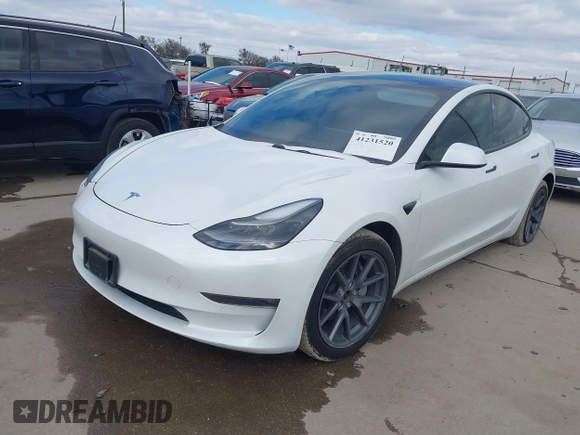 2021 Tesla Model 3 Long Range with VIN 5YJ3E1EB9MF059554, listed as a IAAI auction lot 41231520 with 63,696 mi miles and . Bid and sale history available at DreamBid. Image 16.