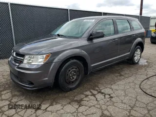 2014 Dodge Journey American Value with VIN 3C4PDCAB1ET135504, listed as a Copart auction lot 58803645 with 164,501 mi miles and Clean title. Bid and sale history available at DreamBid. Image 1.