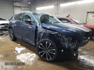 2024 Mazda CX-50 Premium z VIN 7MMVABDY0RN174004, wystawiony jako Copart lot #44727115 z przebiegiem 4 796 mil mil oraz Szkoda całkowita • Salvage title. Historia ofert i sprzedaży dostępna na DreamBid. Obrazek 4.