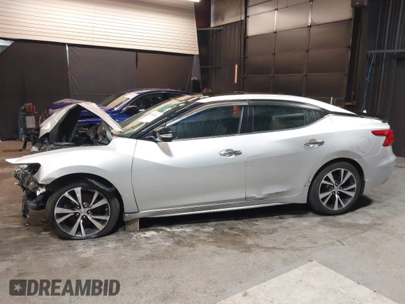 2016 Nissan Maxima SV z VIN 1N4AA6AP4GC415952, wystawiony jako IAAI lot #41806306 z przebiegiem 131 612 mil mil oraz . Historia ofert i sprzedaży dostępna na DreamBid. Obrazek 15.