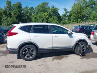 2019 Honda CR-V Touring с VIN JHLRW2H98KX003911, выставлен на аукционе IAAI как лот 42306400 с пробегом 105 780 миль миль и . История ставок и продаж доступна на DreamBid. Изображение 13.