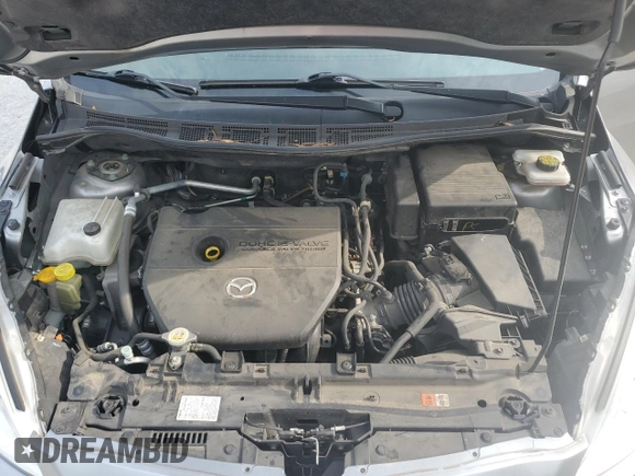 2014 Mazda 5 Grand Touring with VIN JM1CW2DL1E0165803, listed as a Copart auction lot 62914124 with 71,127 mi miles and Salvage Title. Bid and sale history available at DreamBid. Image 12.