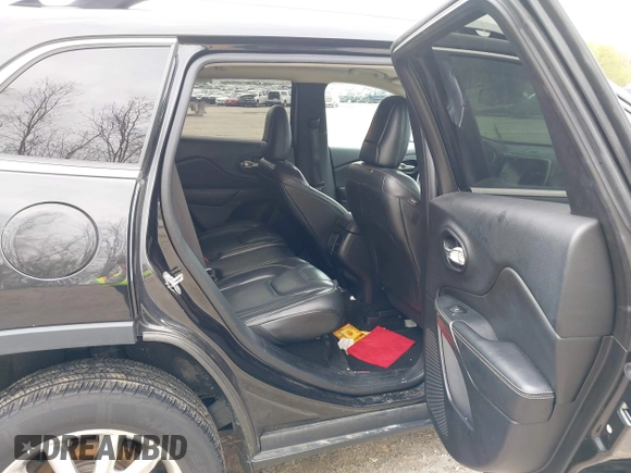 2015 Jeep Cherokee Limited with VIN 1C4PJMDB9FW680565, listed as a IAAI auction lot 42134052 with 192,728 mi miles. Bid and sale history available at carsss.com. Image 8.