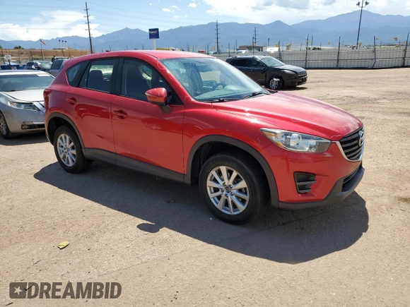 2016 Mazda CX-5 Sport with VIN JM3KE4BYXG0702655, listed as a Copart auction lot 63120205 with 64,403 mi miles and Salvage title. Bid and sale history available at DreamBid. Image 4.