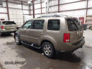 2011 Honda Pilot Touring with VIN 5FNYF4H92BB053458, listed as a IAAI auction lot 41594708 with 136,454 mi miles. Bid and sale history available at carsss.com. Image 3.