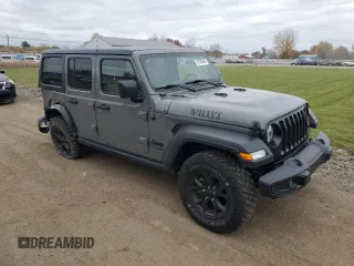 2022 Jeep Wrangler Unlimited Willys with VIN 1C4HJXDN7NW156538, listed as a Copart auction lot 79195464 with 87,081 mi miles and Salvage Title. Bid and sale history available at DreamBid. Image 4.
