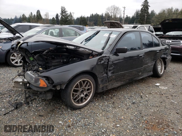 2001 BMW 5 Series 530iA with VIN WBADT63421CF05077, listed as a Copart auction lot 87458184 with 208,351 mi miles and Salvage Title. Bid and sale history available at carsss.com. Image 1.