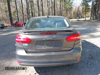 2015 Ford Focus Titanium with VIN 1FADP3J25FL333743, listed as a IAAI auction lot 41857057 with 120,917 mi miles and . Bid and sale history available at carsss.com. Image 17.