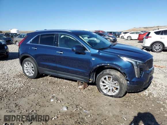 2019 Cadillac XT4 AWD Luxury with VIN 1GYFZBR49KF159269, listed as a Copart auction lot 77130474 with 35,883 mi miles and Salvage Title. Bid and sale history available at carsss.com. Image 4.