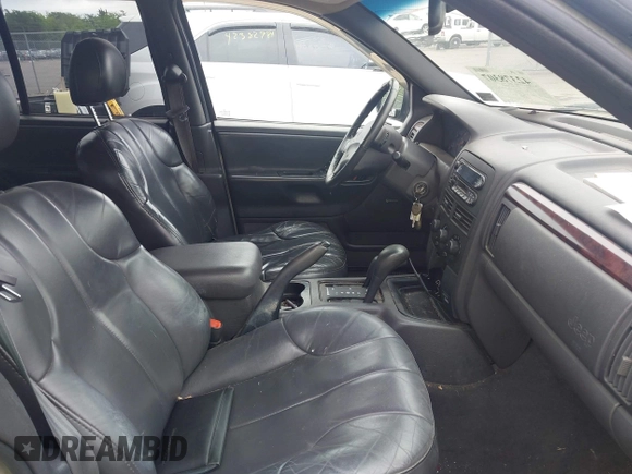 2000 Jeep Grand Cherokee Laredo with VIN 1J4GW48N9YC191779, listed as a IAAI auction lot 42378307 with 224,836 mi miles and . Bid and sale history available at DreamBid. Image 5.