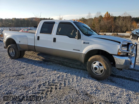 2003 Ford F-350 XL with VIN 1FTWW33F93EA39932, listed as a Copart auction lot 82341464 with 338,158 mi miles and Salvage Title. Bid and sale history available at DreamBid. Image 4.